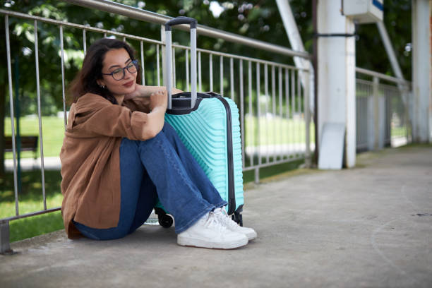 istock Young lady waiting for bus 1539088782