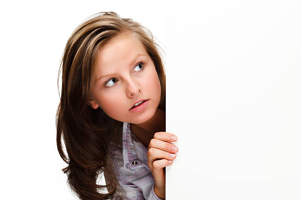 istock Young woman standing behind white board 153908891
