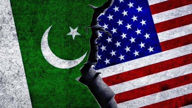istock USA and Pakistan painted flags on a wall with a crack. 1539089898