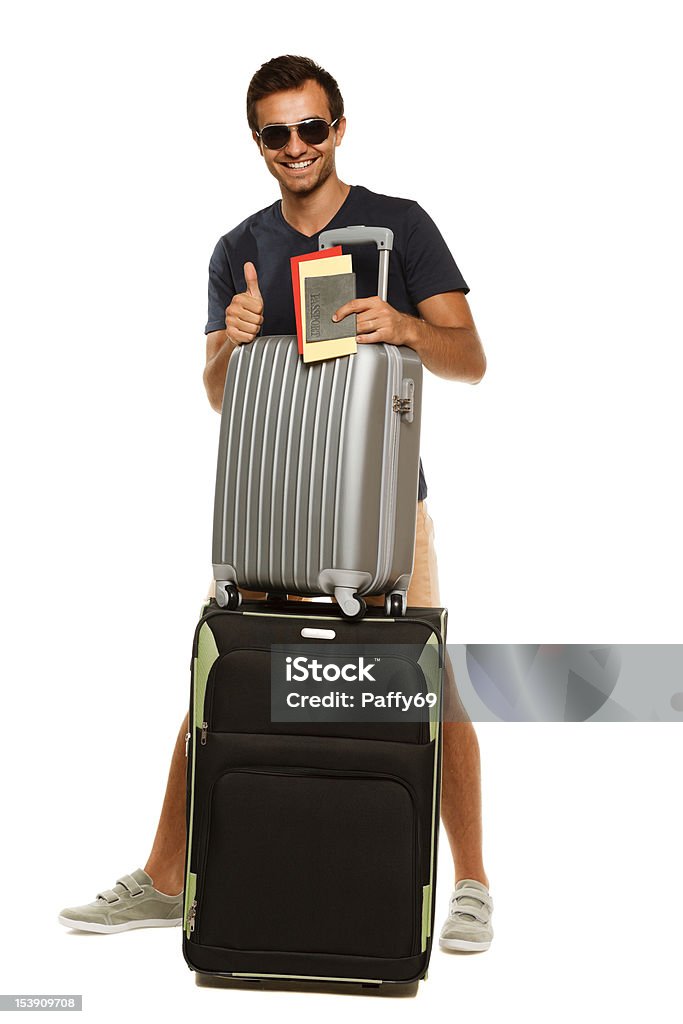Szczęśliwy mężczyzna z walizki z kciuka - Zbiór zdjęć royalty-free (Białe tło)