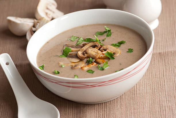 Mushroom soup Freshly made mushroom soup in a bowl cream soup stock pictures, royalty-free photos & images