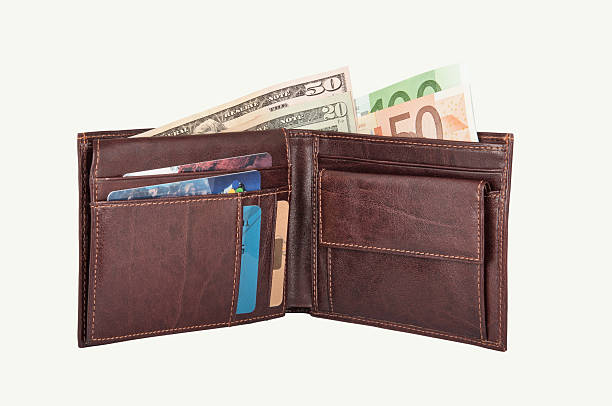 istock Dollars and Euros in Wallet 153915549