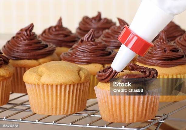 Icing Cup Cakes Stock Photo - Download Image Now - Cake, Chocolate, Close-up