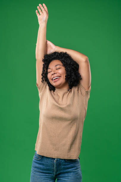 istock Young cute woman looking relaxed and peaceful 1539183114
