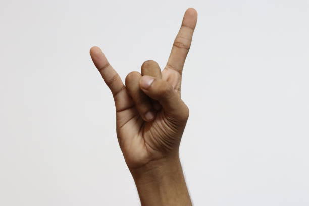 istock Rock star Hand Gesture in a white isolated background 1539190446