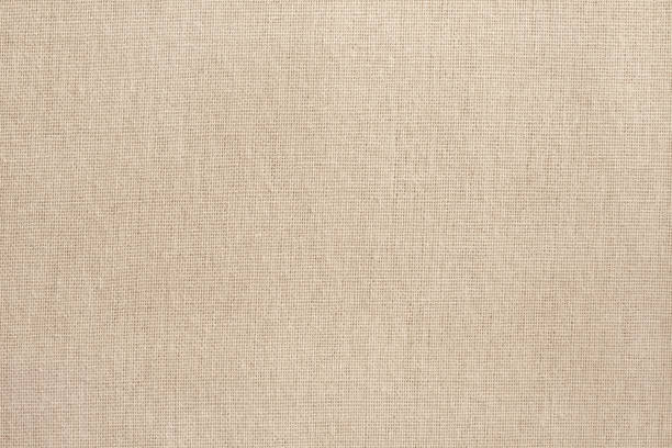istock Brown cotton fabric texture background, seamless pattern of natural textile. 1539196895