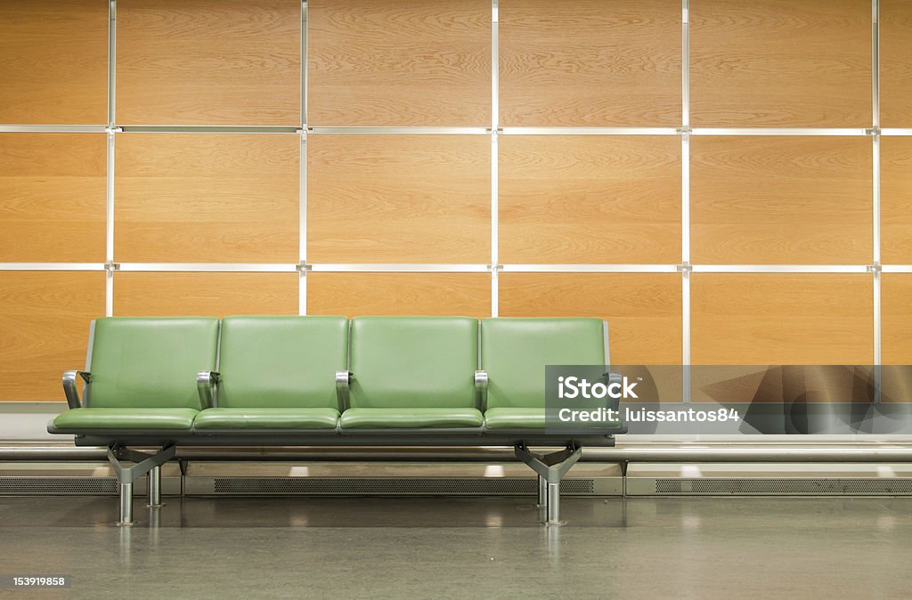 Seats empty seats at a business building against a wooden wall (gorgeous interior setting) Airport Stock Photo