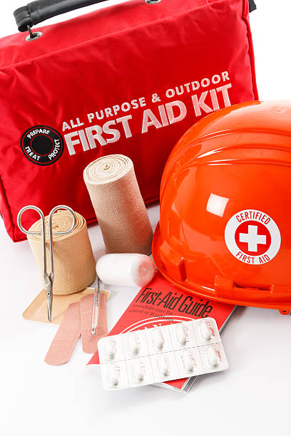 istock First aid kit with bandages and hardhat 153920505