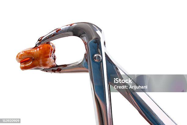 Forceps And Tooth Closeup Stock Photo - Download Image Now - Dental Equipment, Removing, Blood