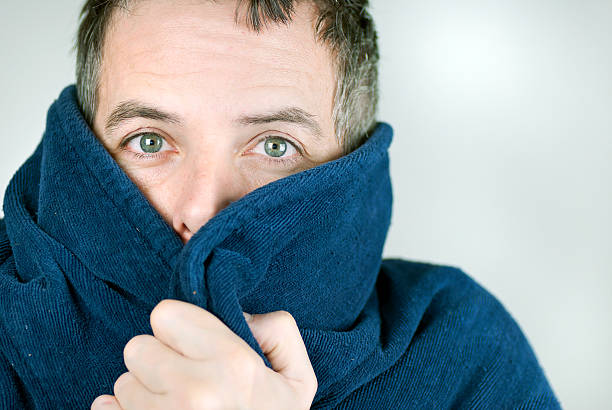 istock Man Bundled Up In Housecoat 153922893
