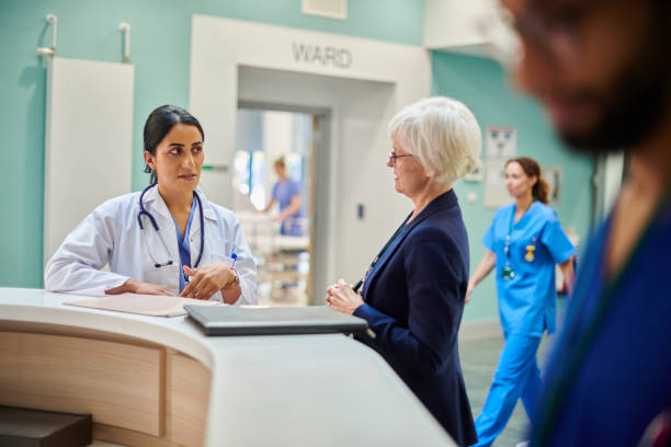 istock female doctor chatting to administrator 1539234002