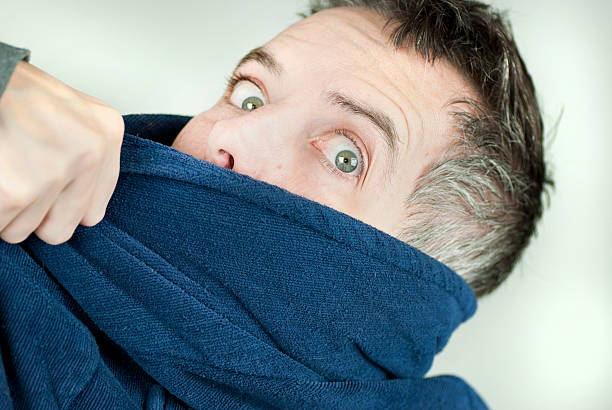 istock Man Wearing Housecoat Being Yanked Off Camera 153923842