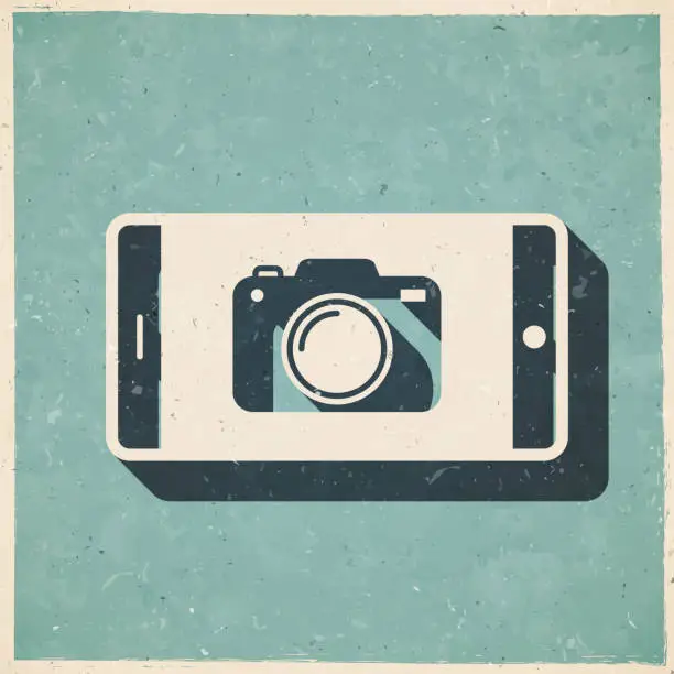 Vector illustration of Smartphone with camera. Icon in retro vintage style - Old textured paper