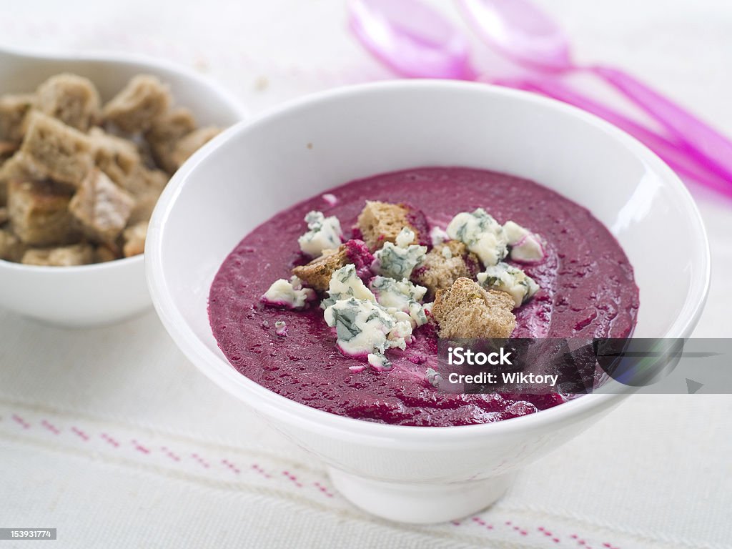 Beet cream soup Beet cream soup with roquefort and croutons, selective focus Beet Stock Photo