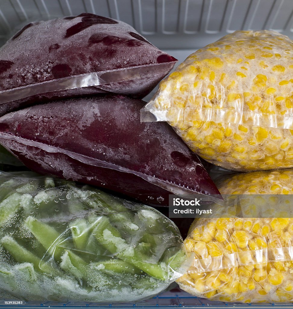 冷蔵庫内冷凍野菜 - 冷凍庫のロイヤリティフリーストックフォト