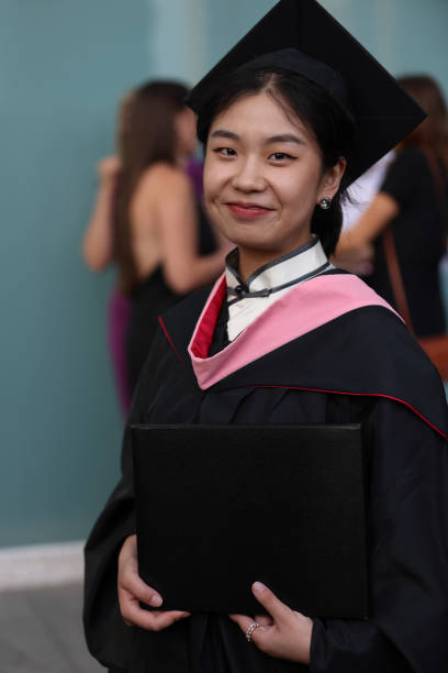 istock Young Chinese lady at University Graduation Day 1539361802