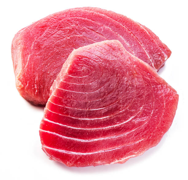 istock Fresh tuna steaks isolated on white background. 1539368699