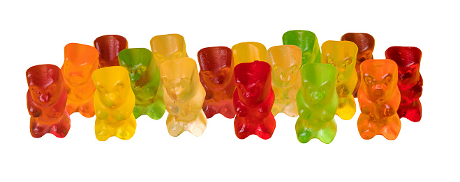 Multicolor fruit gummy candy in the form of a grizzly bear. Jelly Bear isolated on white background