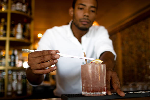 istock latin bartender finishing the bramble 1539407400