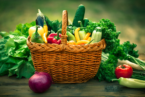 Fall harvest and Autumn season with organic fruit and vegetable on wood background