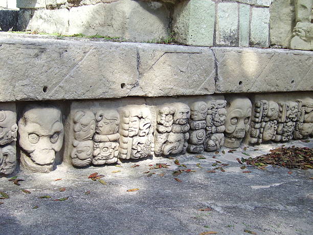 istock Carved in stone skull, Copan Honduras 153948887