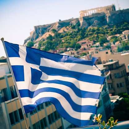 Greece flag - Athens Acropolis, with the Parthenon temple, in the background.