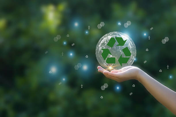 istock Recycle symbol on earth background The concept of maximizing resource utilization 1539492484