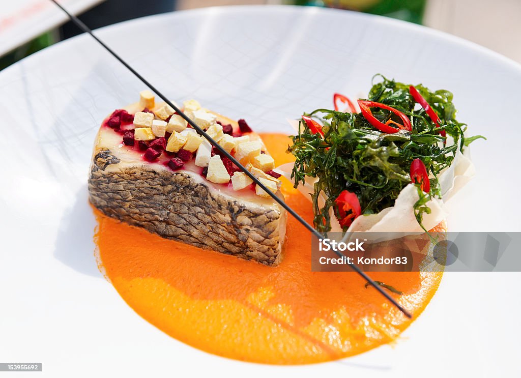 Seabass haute cuisine dish with herbs Seabass haute cuisine dish with herbs and vegetable puree Appetizer Stock Photo