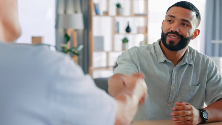 Business people, meeting and handshake for interview, greeting or introduction at the office. Happy businessman shaking hands with employer for b2b, partnership or recruitment and hiring at workplace