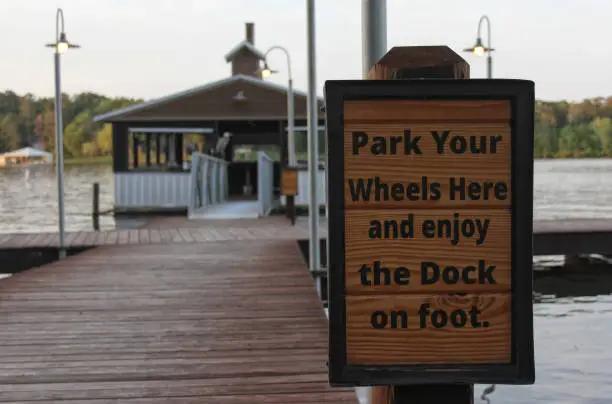 Sign at Boardwalk Pier on Lake in Rural East Tx