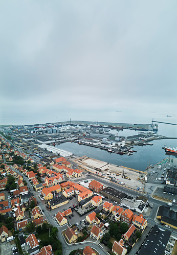 The most Northern city in Denmark is Skagen recognized for fishing and a painter group living there around year 1900. Skagen industrial Harbor with trawlers and industry