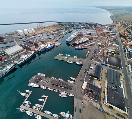 The most Northern city in Denmark is Skagen recognized for fishing and a painter group living there around year 1900. Skagen industrial Harbor with trawlers and industry