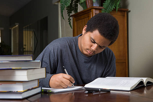 Hard working young black student stock photo