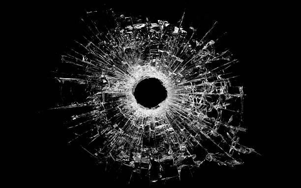 弾痕ガラス張りの絶縁にブラック - bullet hole ストックフォトと画像