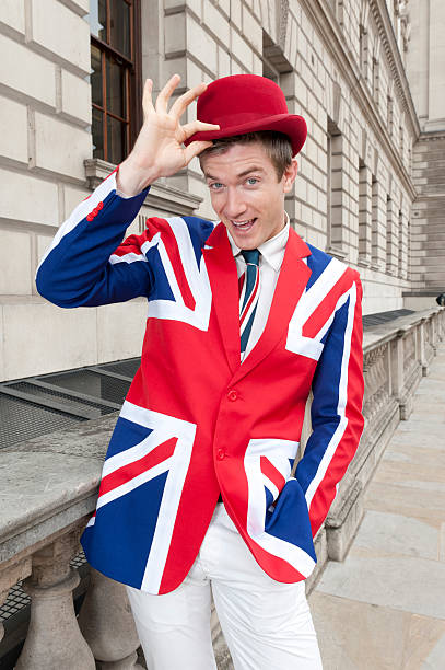 London geezer  in Union Jack jacket and tie and bowler hat