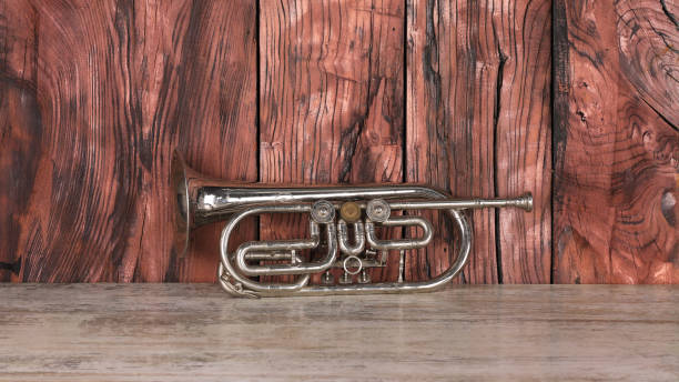 istock horn musical instrument on wooden table 1539646282