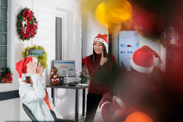istock Team doing social gathering during xmas 1539668322