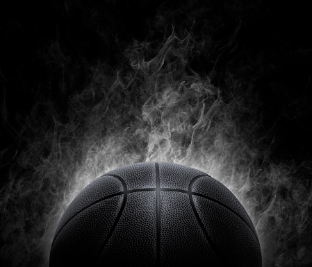 black basketball with on the smoke background