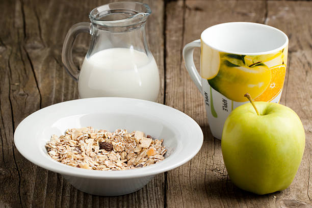 istock Breakfast with muesli, milk and apple 153969056