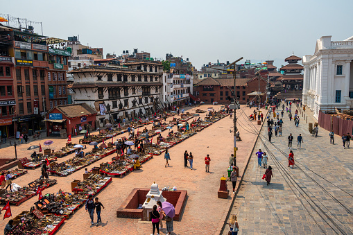 Lalitpur, Nepal - Apr 17, 2023: A landscape around Kathmandu Durbar Square, a historically UNESCO World Heritage Sites in Kathmandu, Nepal. The complex has many landmarks such as Swet Bhairav, Gaddi Baithak, Shree Kalbhairab Temple,Taleju Bhawani Temple, and Kumari Ghar.