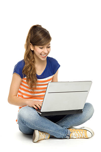 istock Young woman sitting with laptop 153971834