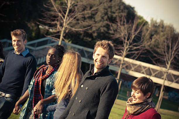 istock People students having a great time in the park 153971910