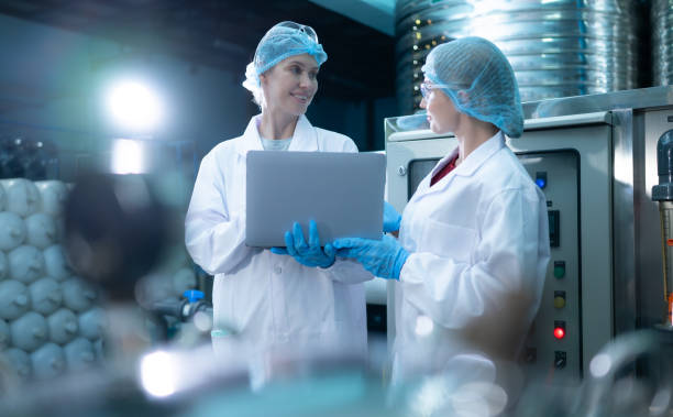 istock Two young female scientists working with tablet computer in drinking water plant 1539727214