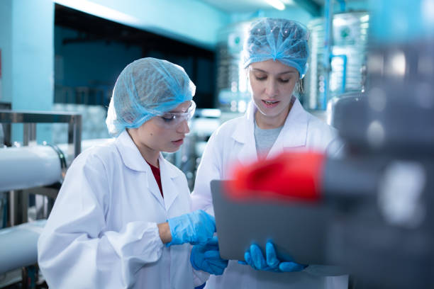 istock Two young female scientists working with tablet computer in drinking water plant 1539727215