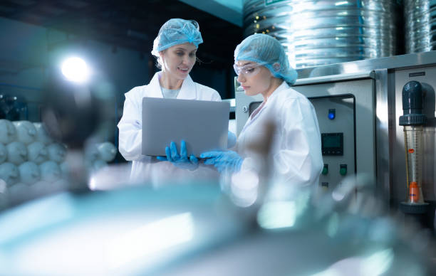 istock Two young female scientists working with tablet computer in drinking water plant 1539727711