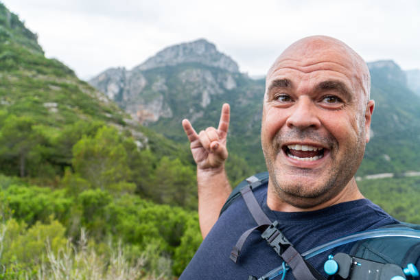 istock sweaty hiker man takes funny selfie 1539736859