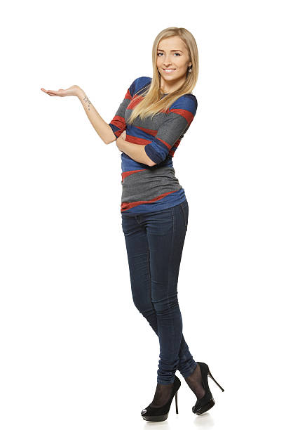 istock Woman showing empty copy space on the open hand palm 153973853