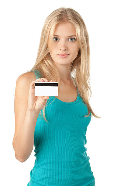 istock Young female showing credit card 153973875