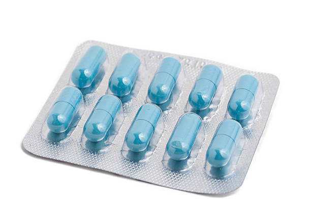 istock Packs of pills isolated on white 153974290