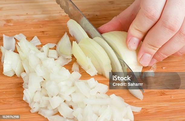 Hands Cutting Onions Stock Photo - Download Image Now - Onion, Cutting, Chopping Food